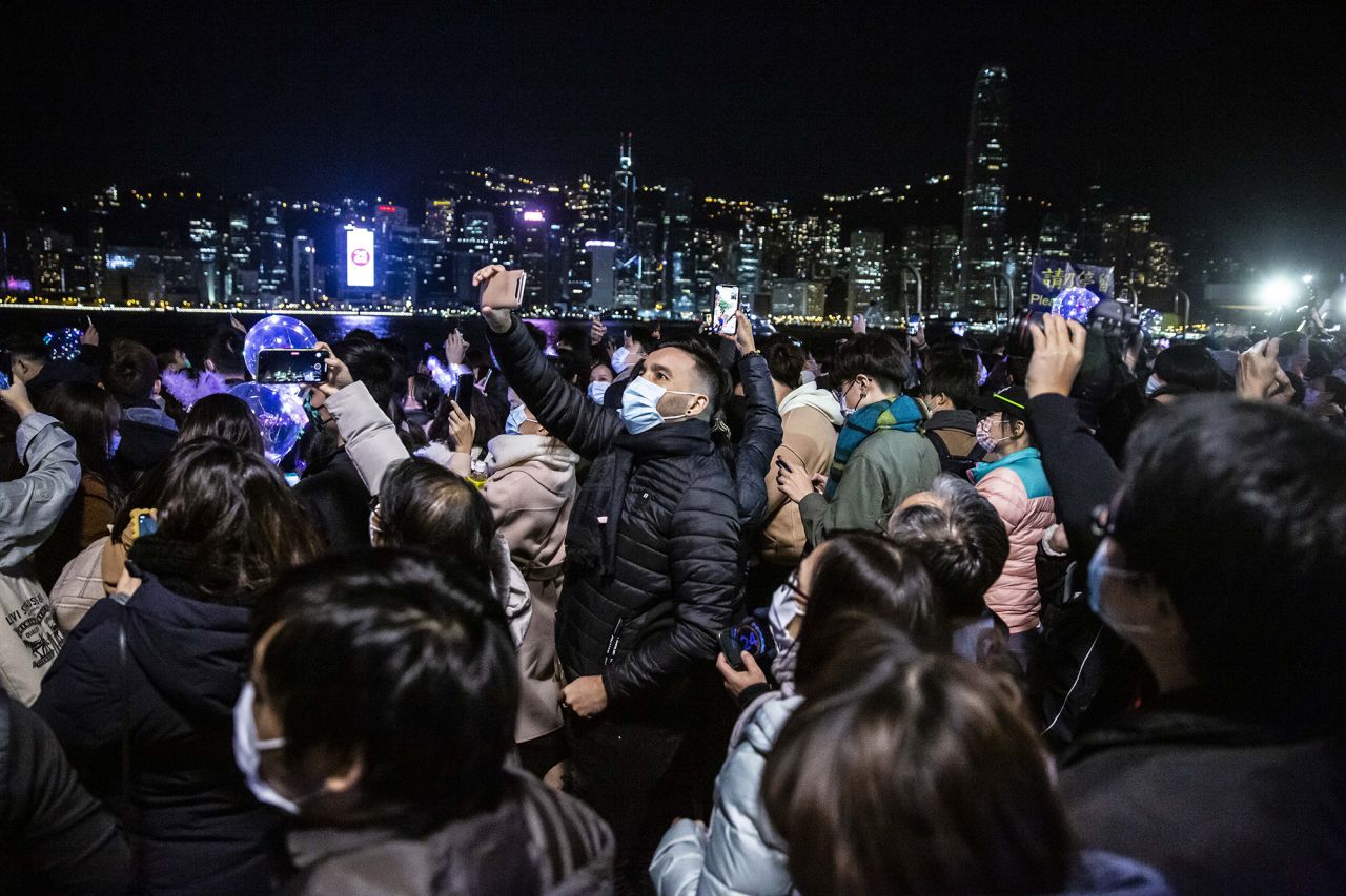People ring in the new year at the Victoria Harbour in Hong Kong.