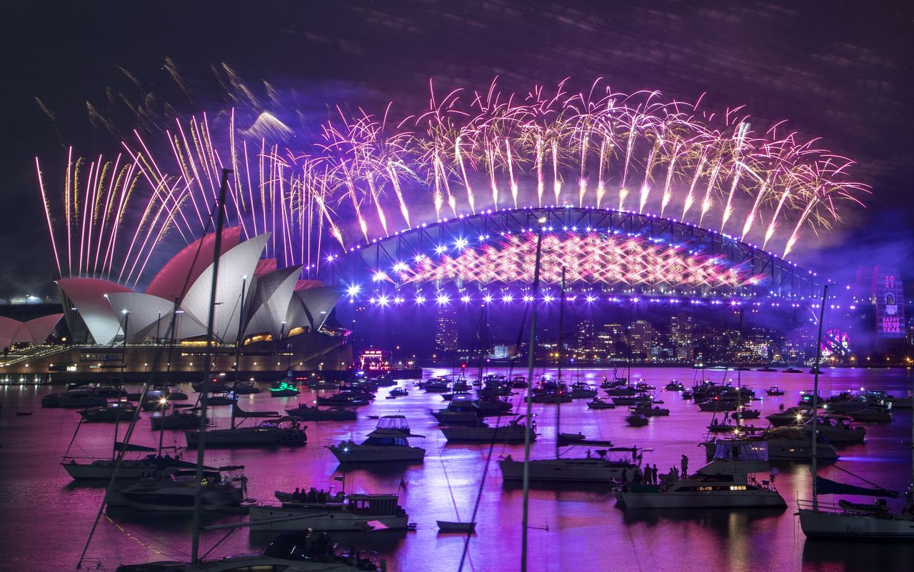 Fireworks explode over the Sydney Opera House and Harbour Bridge in Australia.