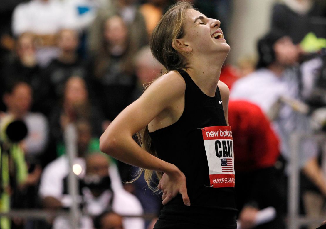 Mary Cain reacts after breaking the high school girls' record during the women's two mile event at the New Balance Indoor Grand Prix track meet in 2013.