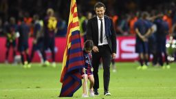 Football - FC Barcelona v Juventus - UEFA Champions League Final - Olympiastadion, Berlin, Germany - 6/6/15 
Barcelona coach Luis Enrique celebrates with his daughter after winning the UEFA Champions League 
Reuters / Dylan Martinez