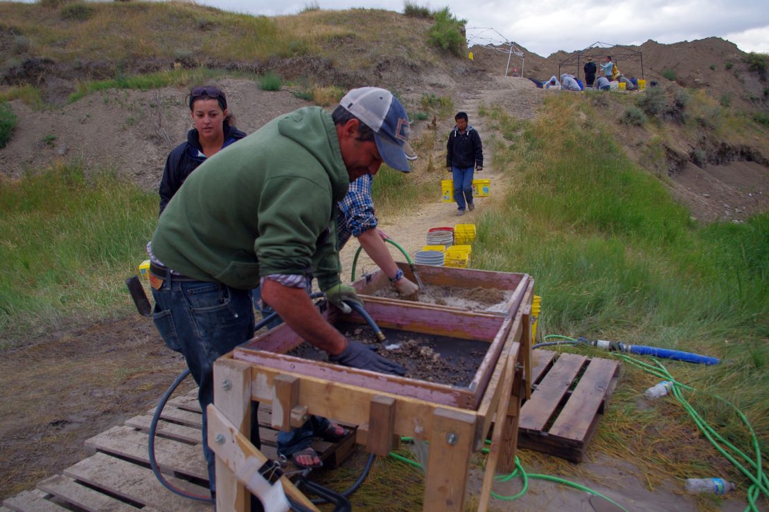 Co-principal investigator Todd Surovell water screens sediment from La Prele in 2016. Archaeologists use water screening to find tiny artifacts like bone needles.