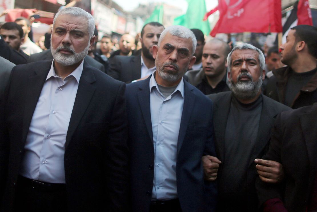 Sinwar, pictured center, attends the funeral of a senior Hamas militant alongside Ismail Haniyeh in Gaza City in 2017.