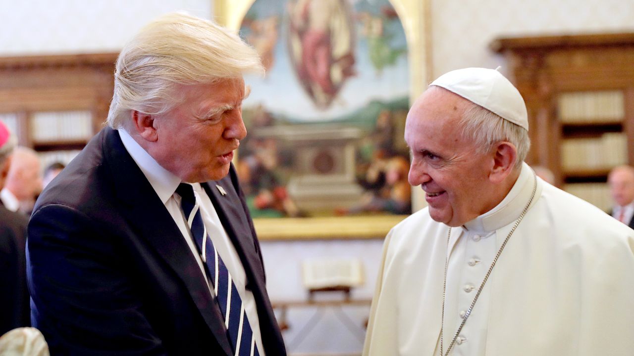 Pope Francis talks with US President Donald Trump during a private audience at the Vatican, on May 24, 2017.