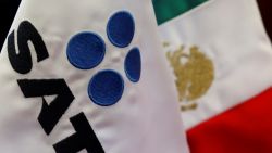 A flag with the logo of the Tax Administration Service (SAT), is seen at their offices in Mexico City, Mexico May 26, 2017. Picture taken May 26. REUTERS/Carlos Jasso