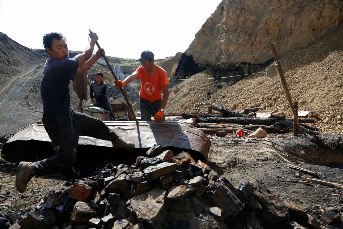 Mongolian miners work on extracting coal from a primitive mine in Nalaikh, one of the nine districts of Mongolian capital Ulaanbaatar, Mongolia June 29, 2017.
