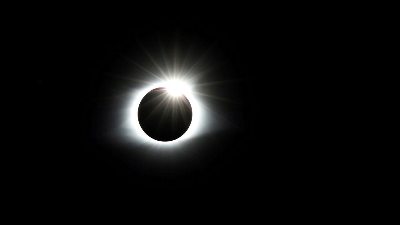 The solar eclipse creates the effect of a diamond ring at totality as seen from Clingmans Dome, which at 6,643 feet (2,025m) is the highest point in the Great Smoky Mountains National Park, Tennessee, U.S. August 21, 2017. Location coordinates for this image are 35Âº33'24" N, 83Âº29'46" W. REUTERS/Jonathan Ernst     TPX IMAGES OF THE DAY