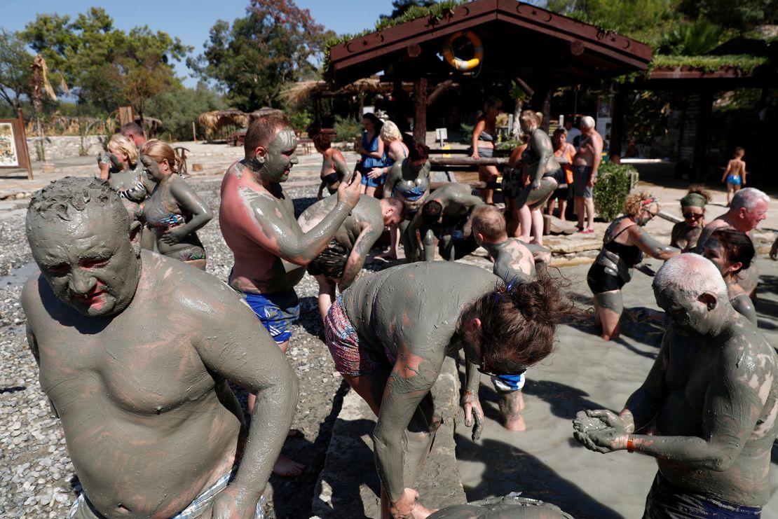 Tourists flock to Dalyan's mud baths to rejuvenate their skin.