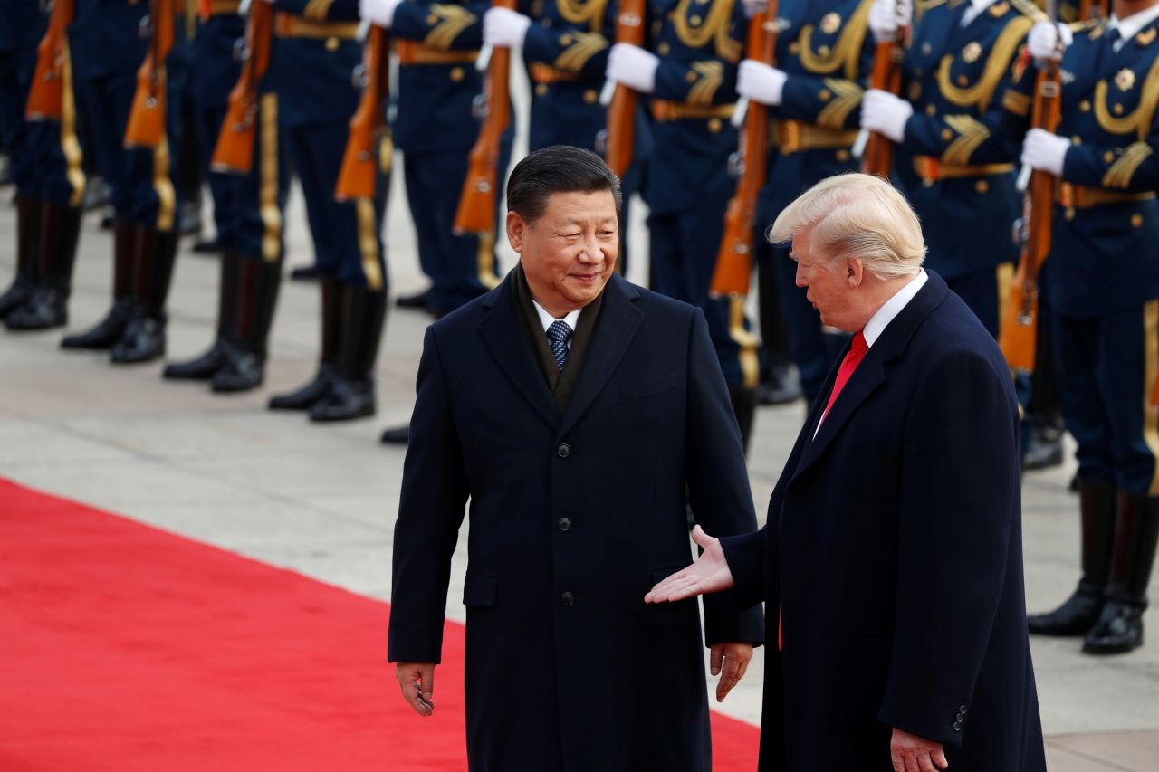 Then-President Donald Trump takes part in a welcoming ceremony with Chinese President Xi Jinping in Beijing in 2017.