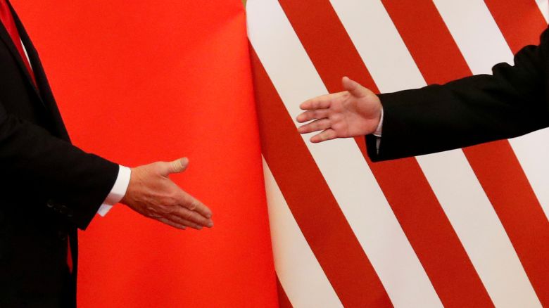 U.S. President Donald Trump and China's President Xi Jinping shake hands after making joint statements at the Great Hall of the People in Beijing, China, November 9, 2017.