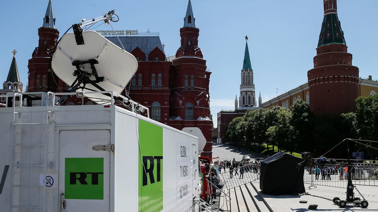 Vehicles of Russian state-controlled broadcaster Russia Today (RT) are seen near the Red Square in central Moscow, Russia June 15, 2018. Picture taken June 15, 2018.  REUTERS/Gleb Garanich