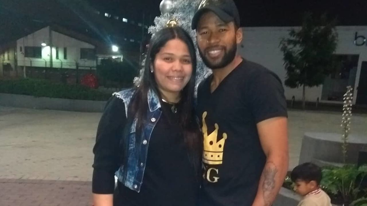 Jerce Reyes and his partner Mariyin Araujo in 2018. Reyes's soccer themed tattoo is visble on his left arm.