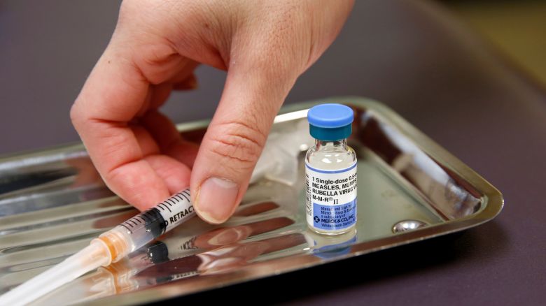 A vial of the measles, mumps, and rubella virus (MMR) vaccine is pictured at the International Community Health Services clinic in Seattle, Washington, U.S., March 20, 2019. Picture taken March 20, 2019.  REUTERS/Lindsey Wasson