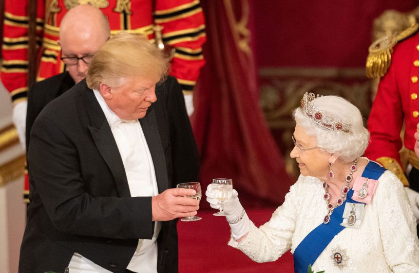 President Donald Trump raises a glass in toast alongside Britain's Queen Elizabeth, at the State Banquet at Buckingham Palace in June 2019.