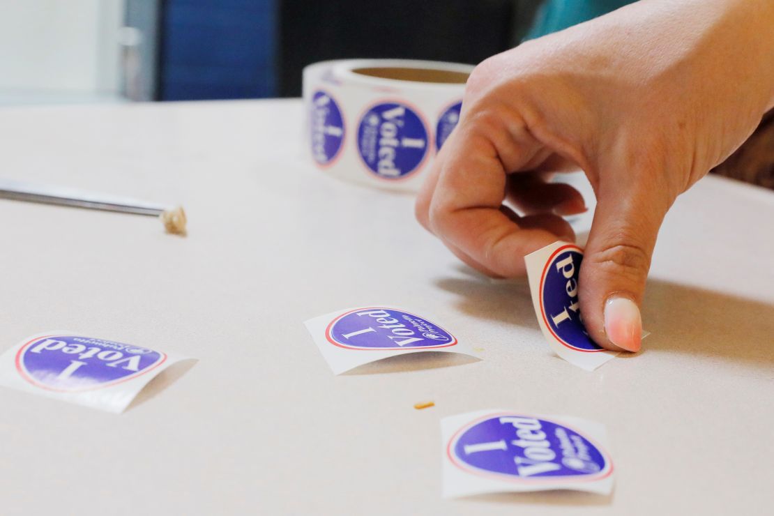 A voter takes an 