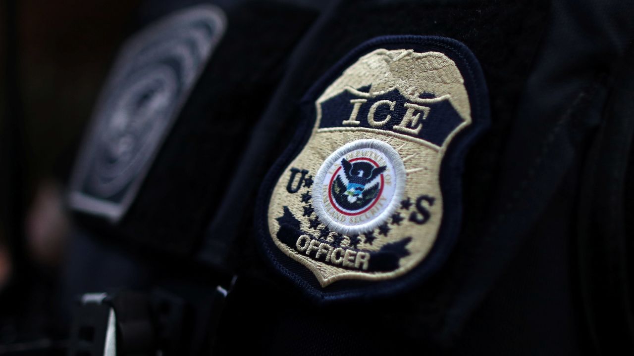 The badge of a U.S. Immigration and Customs Enforcement's officer is seen in 2020. In June 2024, federal agents arrested eight Tajikistan nationals believed to have connections to ISIS.