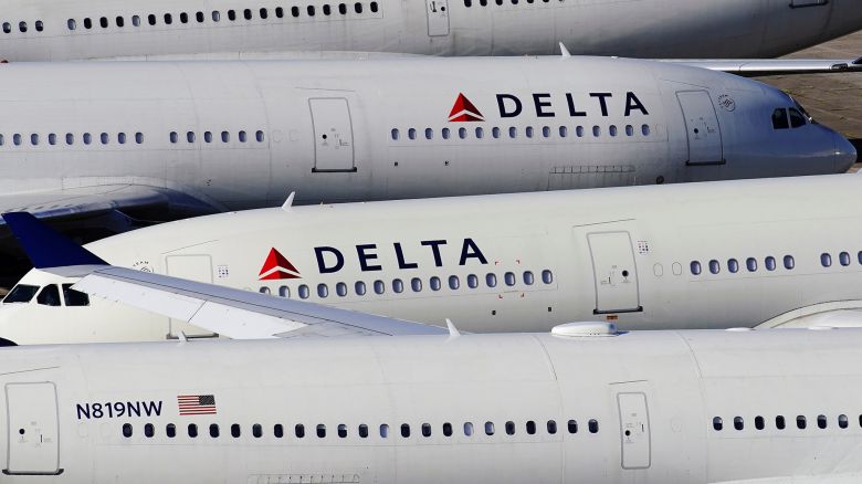 Delta Air Lines passenger planes are seen parked due to flight reductions made to slow the spread of coronavirus disease (COVID-19), at Birmingham-Shuttlesworth International Airport in Birmingham, Alabama, U.S. March 25, 2020.  REUTERS/Elijah Nouvelage
