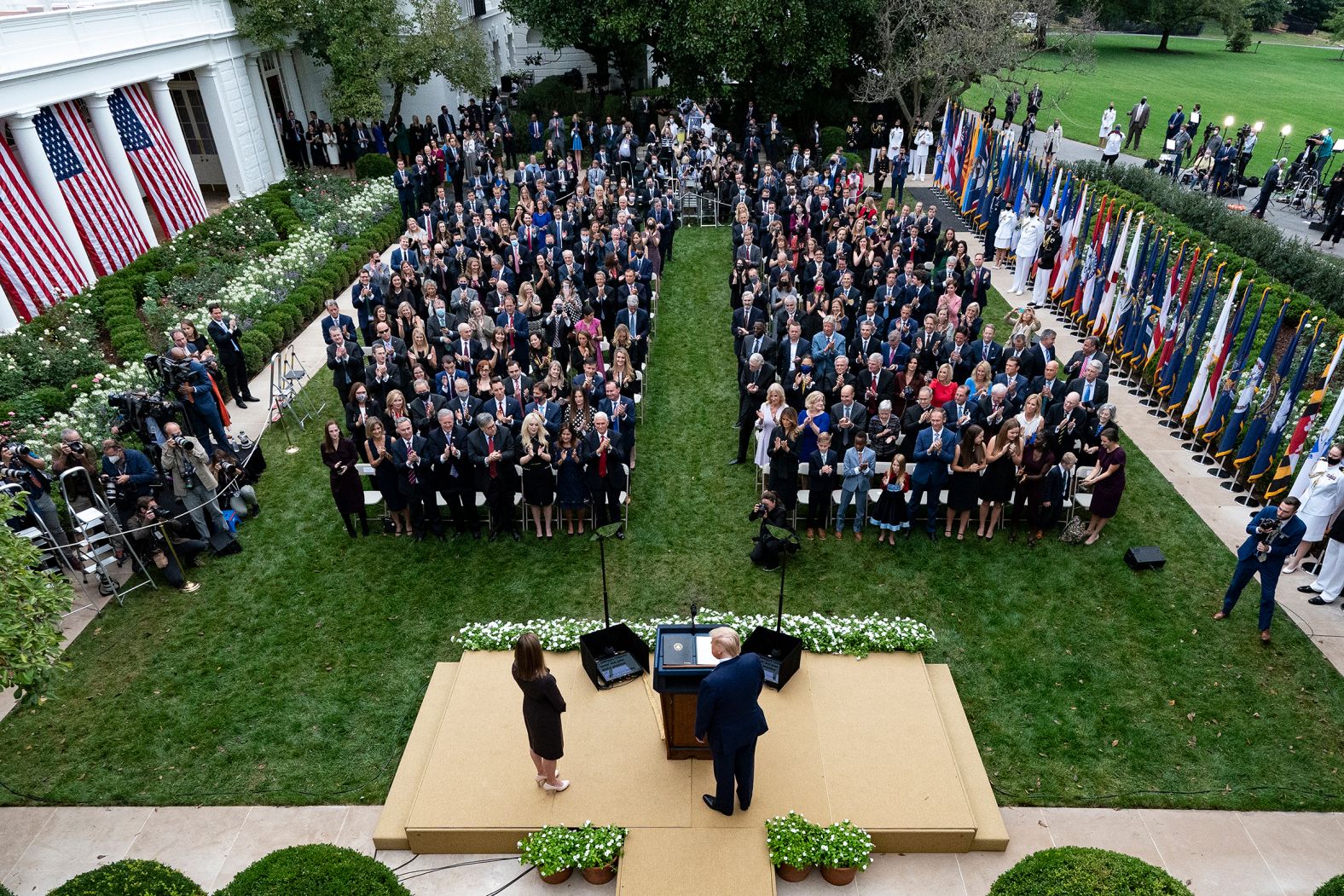 President Donald Trump, center, introduces Judge Amy Coney Barrett as his nominee to the Supreme Court in June 2020.