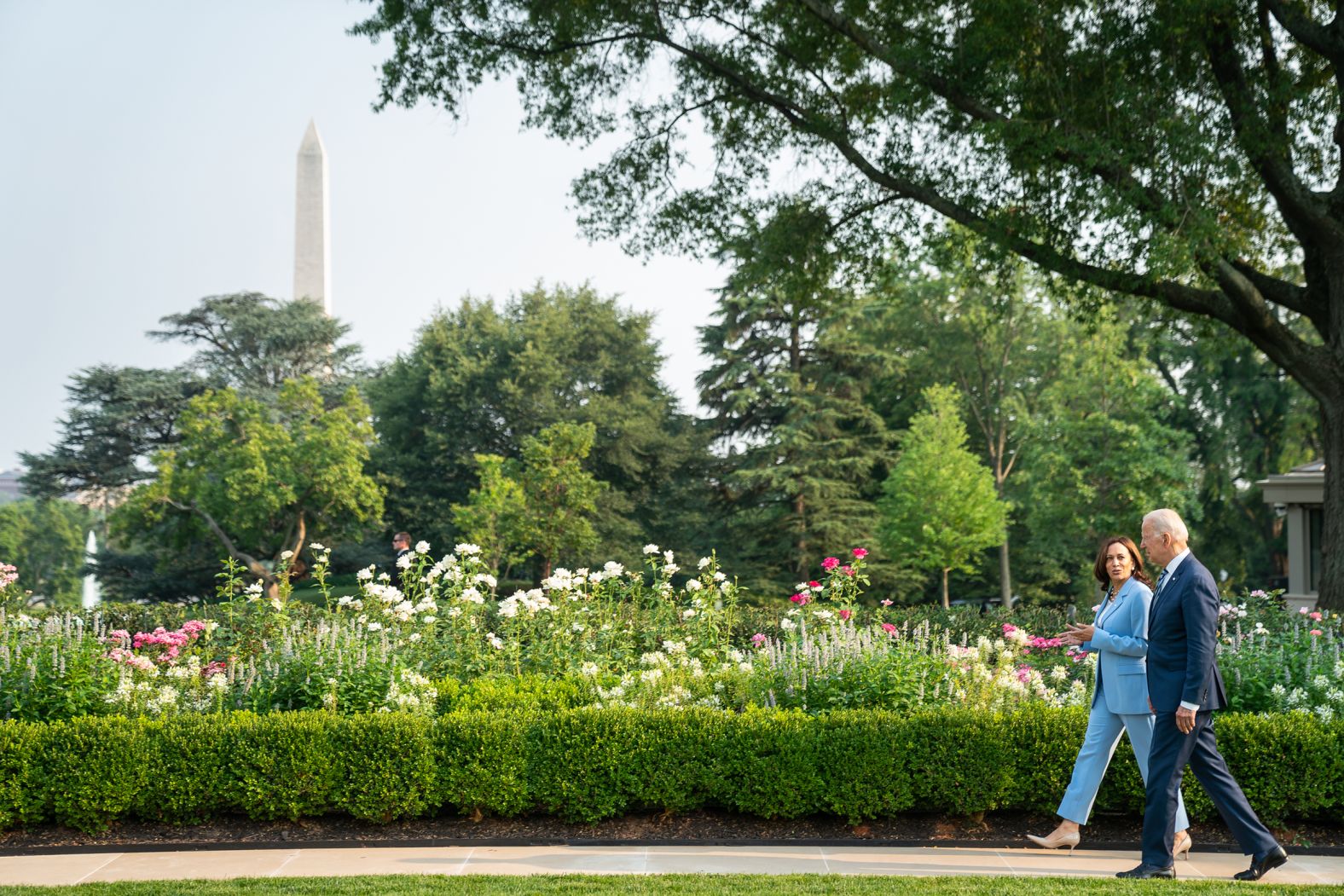 President Joe Biden and Vice President Kamala Harris talk during a walk through the Rose Garden in July 2021.