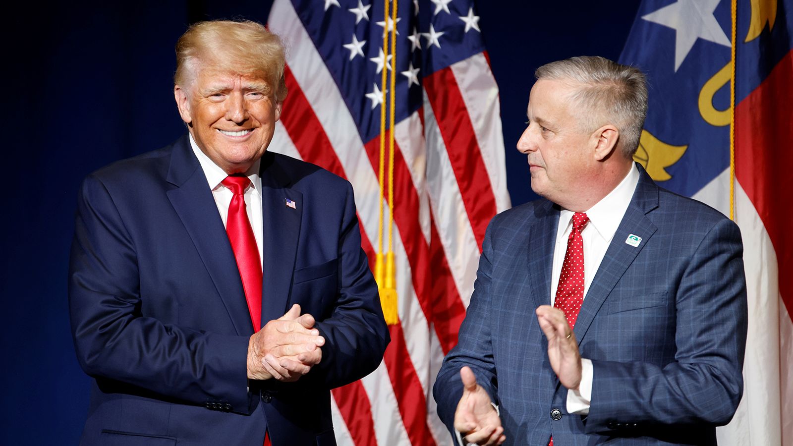 Former President Donald Trump is introduced by North Carolina Republican Party Chairman Michael Whatley before speaking at the North Carolina GOP convention dinner in Greenville, North Carolina, June 5, 2021.