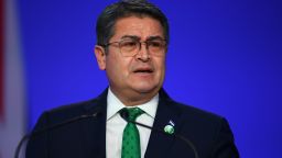Honduras' President Juan Orlando Hernandez presents his national statement as a part of the World Leaders' Summit at the UN Climate Change Conference (COP26) in Glasgow, Scotland, on November 1, 2021.