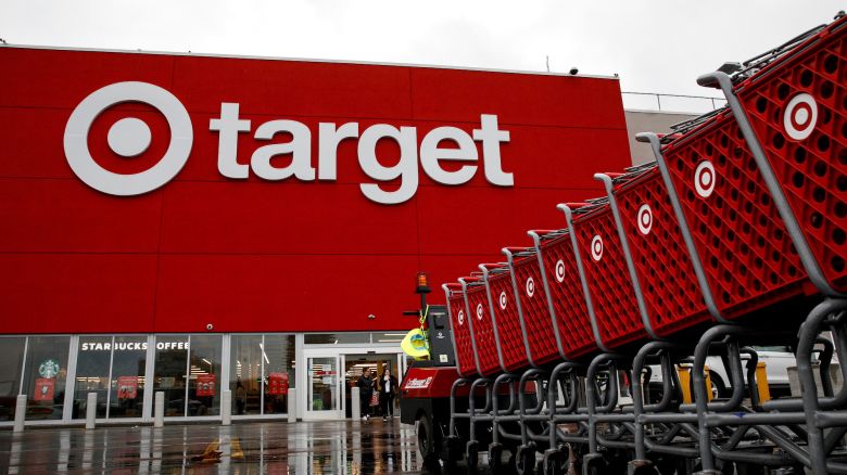 Shoping carts are wheeled outside a Target Store during Black Friday sales in Brooklyn, New York, U.S., November 26, 2021.