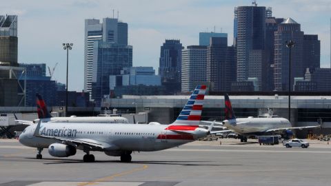 Planes taxi at Logan Airport in Boston on June 30, 2022.