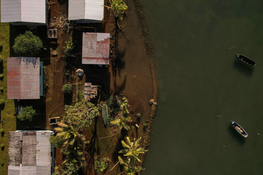 Seawater floods past a sea wall into the community of Veivatuloa Village, Fiji, July 16, 2022.