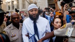 Adnan Syed, whose case was chronicled in the hit podcast “Serial,” exits the courthouse after a judge overturned Syed's 2000 murder conviction and ordered a new trial during a hearing at the Baltimore City Circuit Courthouse in Baltimore, Maryland U.S., September 19, 2022.