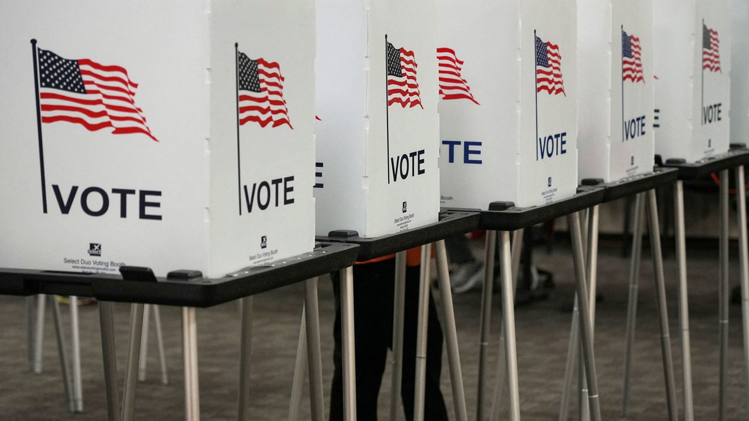 Voting booths are pictured inside the Dona Ana County Government Center during early voting for the upcoming midterm elections in Las Cruces, New Mexico, on October 24, 2022.