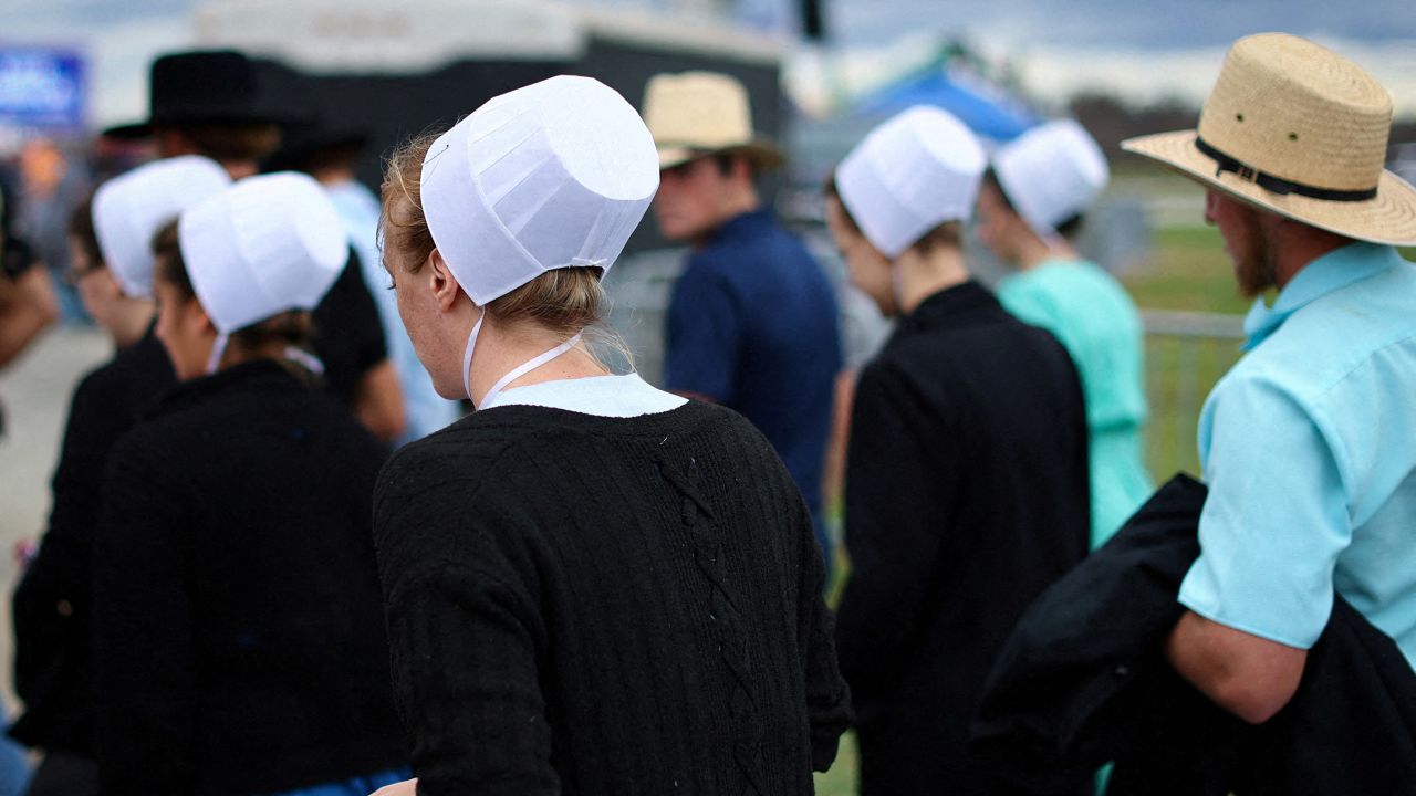 A group of Amish people arrive at a political rally in Latrobe, Pennsylvania, on November 5, 2022.