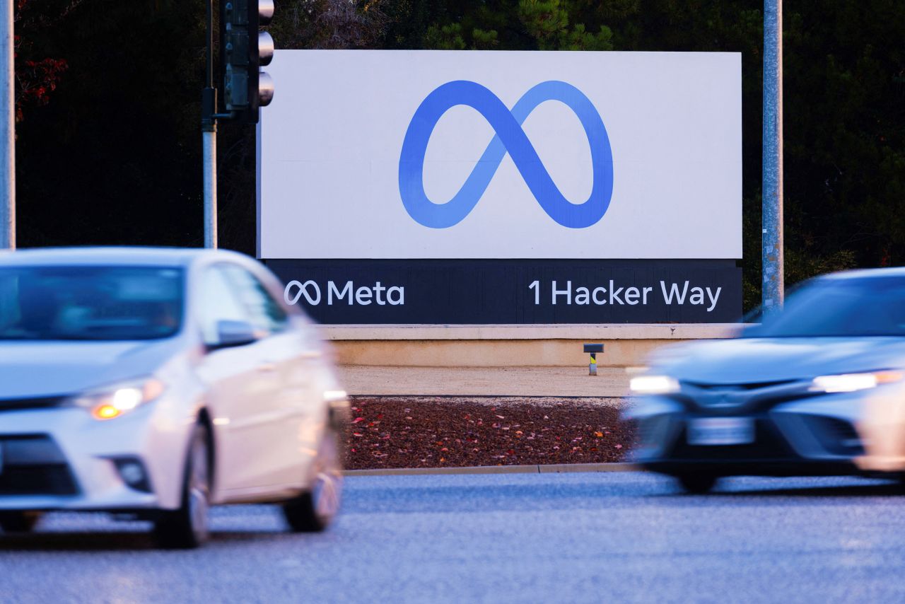 Commuters flow past the Meta sign in Mountain View, California, on November 9, 2022.