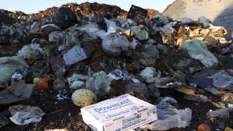 A box of frozen lobster tails is discarded with other food scraps in San Francisco, US, in 2022.