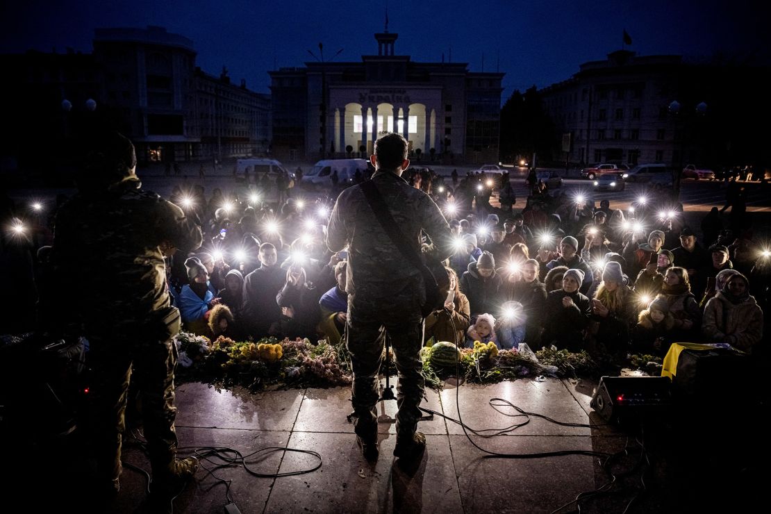 Ukrainian musician Kolya Serga plays to a crowd in Kherson's central Freedom Square on November 18.