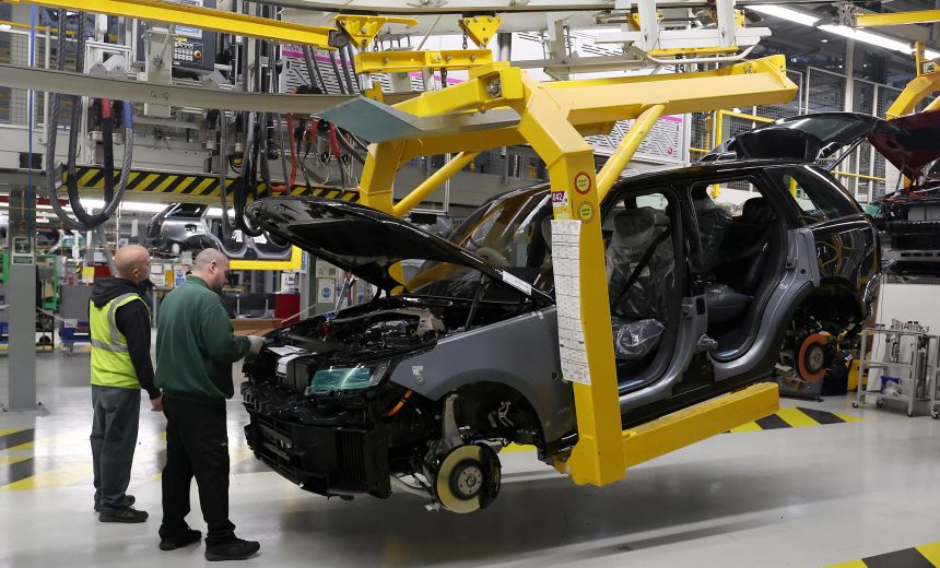 A member of staff works on the production line at Jaguar Land Rover’s factory in Solihull, Britain, December 15, 2022.