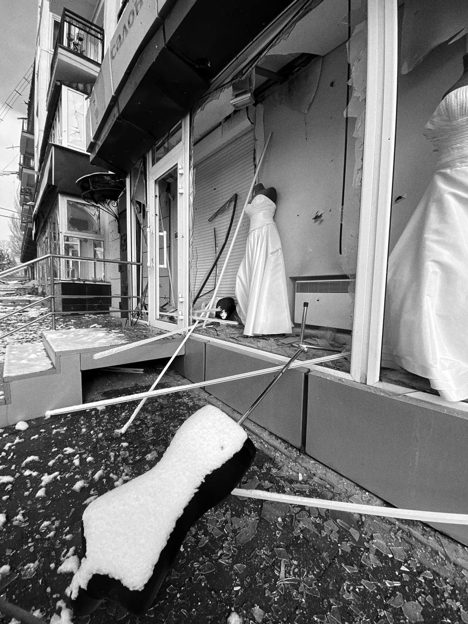 A damaged storefront is seen on March 9. - (The city has been under constant shelling for weeks.)