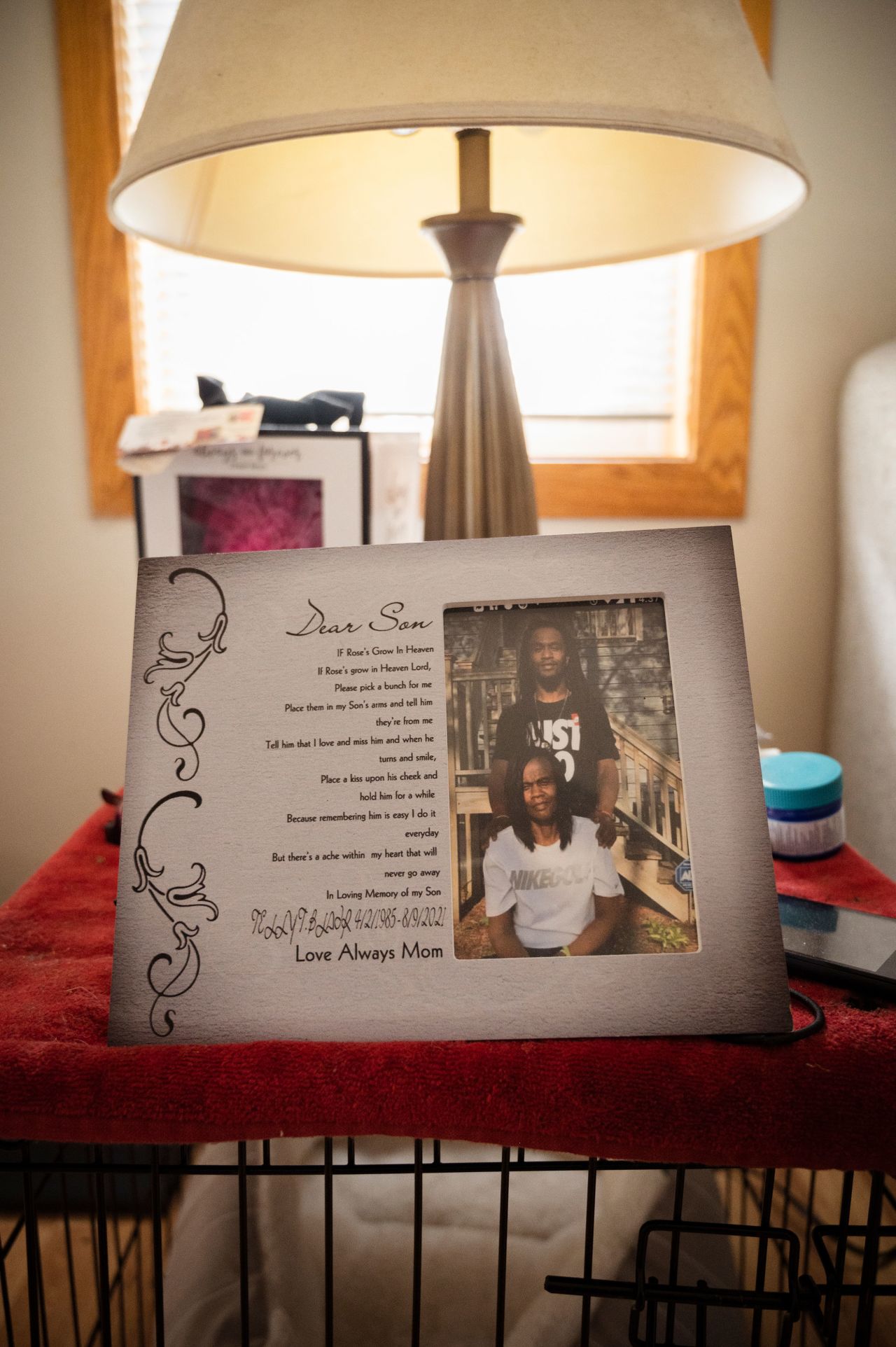 A photo of Telly Blair and his mother, Marnette, rests on a table in their home in north Minneapolis. - (Marnette Gordon, 61, mother of Telly Blair, 36, who lost his life to gun violence in north Minneapolis, photographed in her home.)