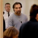 Brian Walshe listens to prosecutor Lynn Beland during his arraignment at Quincy District Court on a charge of murdering his wife Ana Walshe, in Quincy, Massachusetts, U.S. on January 18, 2023. Craig F. Walker/Pool via REUTERS