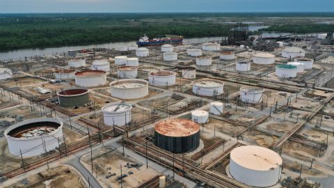 An aerial view of an oil tanker and storage tanks at Exxon Mobil’s Beaumont oil refinery, which produces and packages Mobil 1 synthetic motor oil, in Beaumont, Texas, U.S., March 18, 2023.