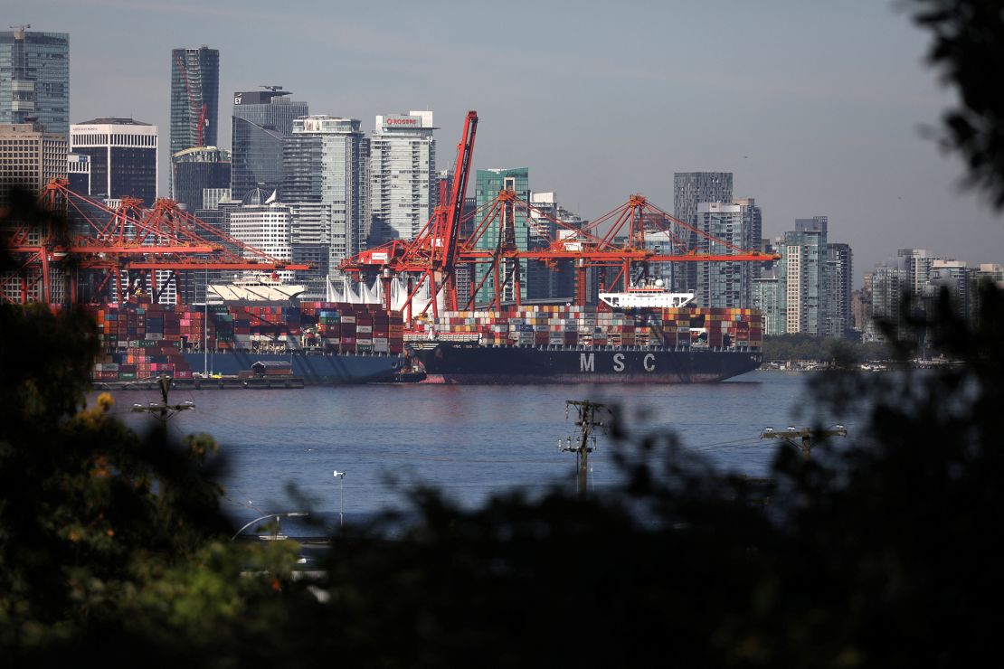 Container ships berth at the Port of Vancouver in July 2023.