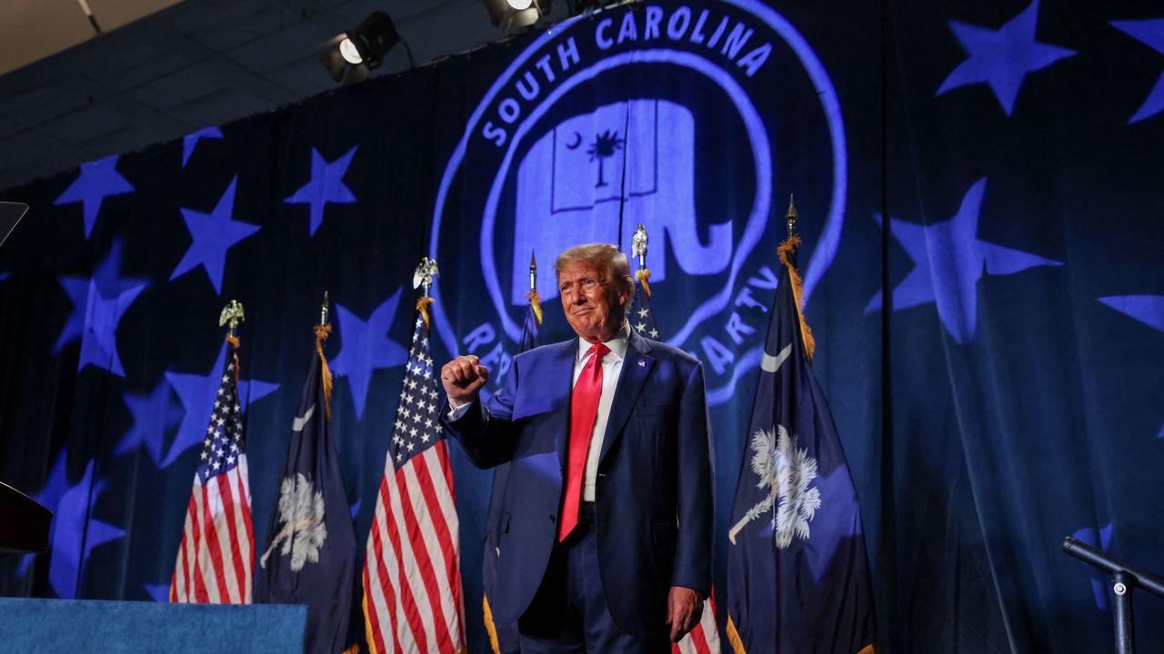 Former President Donald Trump gestures at a Republican fundraising dinner in Columbia, South Carolina, on August 5, 2023.