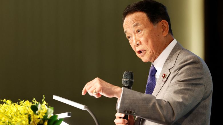 Former Japanese Prime Minister Taro Aso speaks at a forum in Taipei, Taiwan, on August 8, 2023.