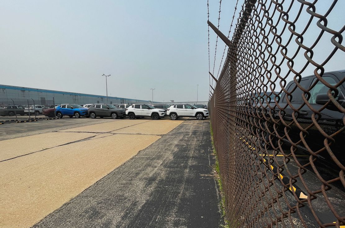 Jeep Cherokee SUV's and Ram trucks fill the parking lot at the Stellantis plant that was idled in February 2023. The plant will be be reopened under the agreement reached between Stellantis and the UAW to end the union's strike at the company.
