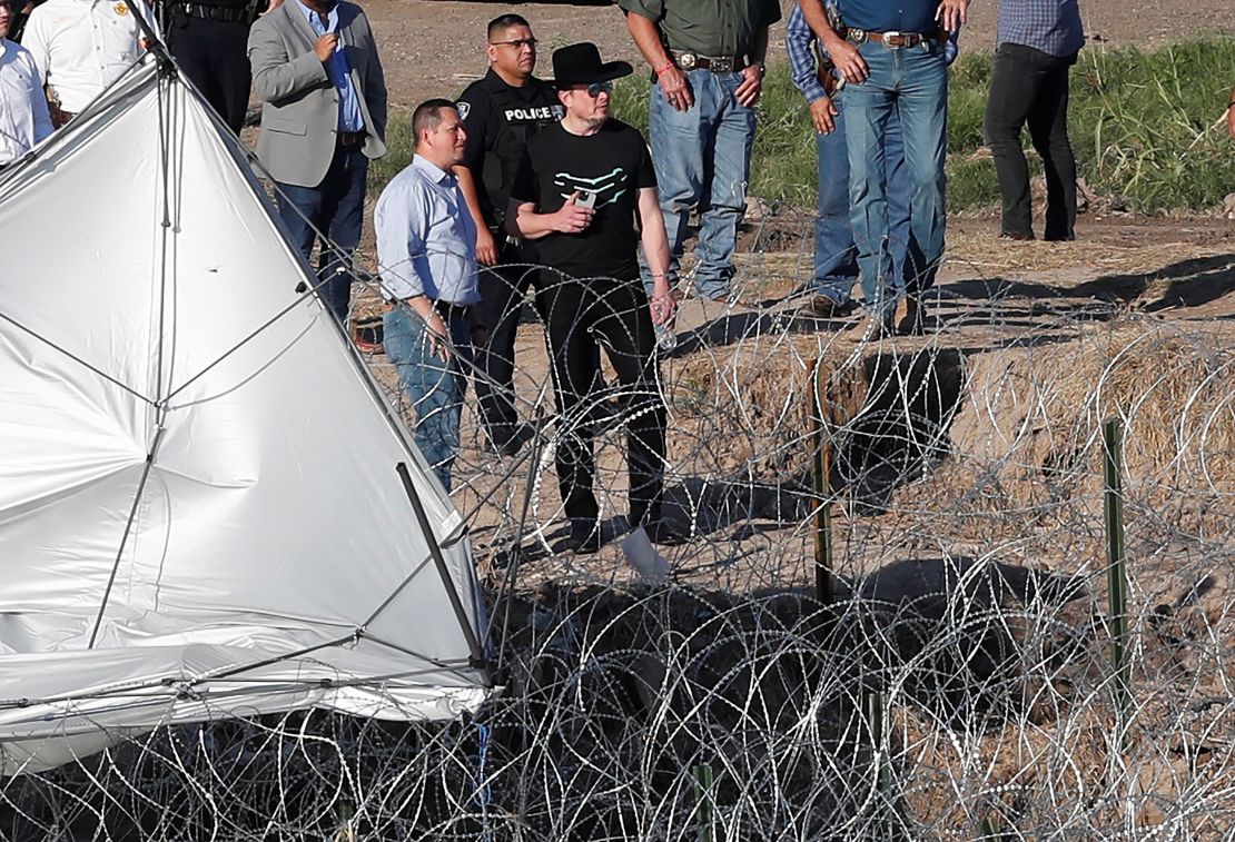 Elon Musk views the Rio Grande during a September 2023 visit to Eagle Pass, Texas. Around the time of that visit, his immigration-related posts on X increased. Now critiques of illegal immigration are a prominent part of Musk's online presence.