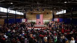Donald Trump rallies with supporters at a "commit to caucus" event at the National Cattle Congress event space in Waterloo, Iowa, on October 7, 2023.