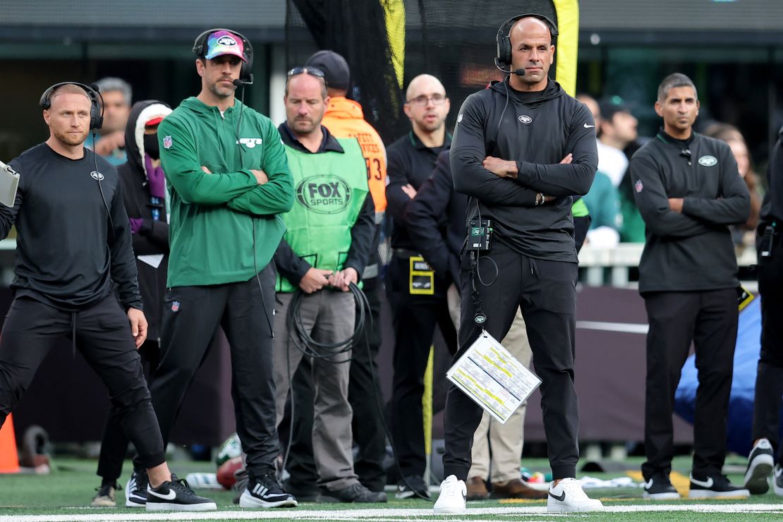 Oct 15, 2023; East Rutherford, New Jersey, USA; The New York Jets injured quarterback Aaron Rodgers (left) and head coach Robert Saleh on the sidelines in the first quarter against the Philadelphia Eagles at MetLife Stadium. Mandatory Credit: Brad Penner-USA TODAY Sports