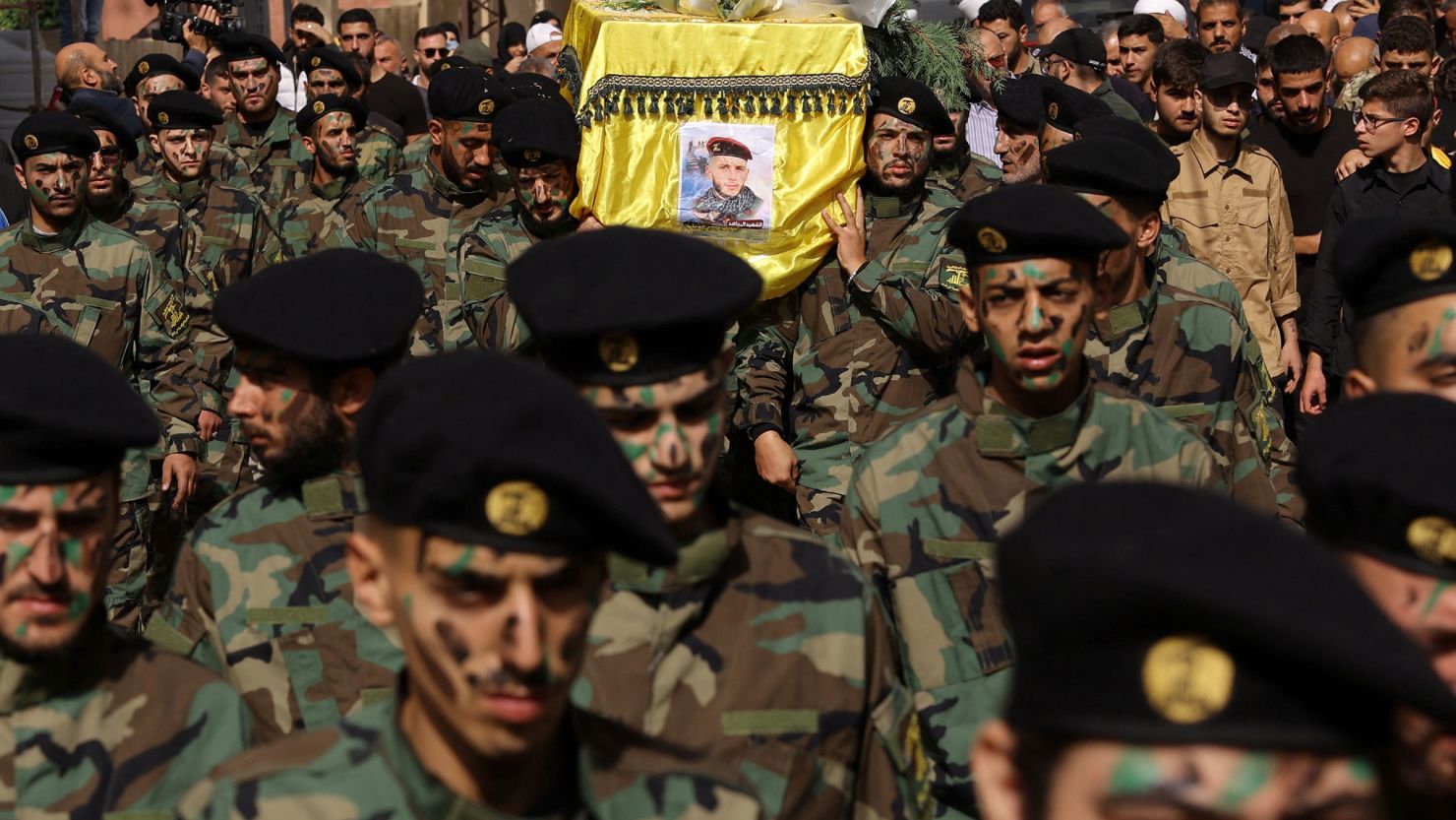 Members of Hezbollah carry the coffin of Hezbollah member Abbas Shuman, who was killed in southern Lebanon amidst tension between Israel and Hezbollah, during his funeral, in Baalbek, Lebanon, on October 23.