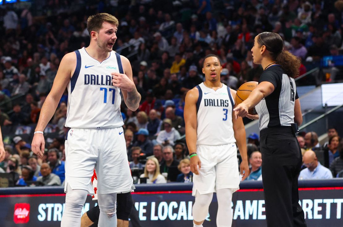 Moyer-Gleich, pictured here speaking to Dallas Mavericks superstar Luka Dončić, has built up six seasons of refereeing experience in the league.