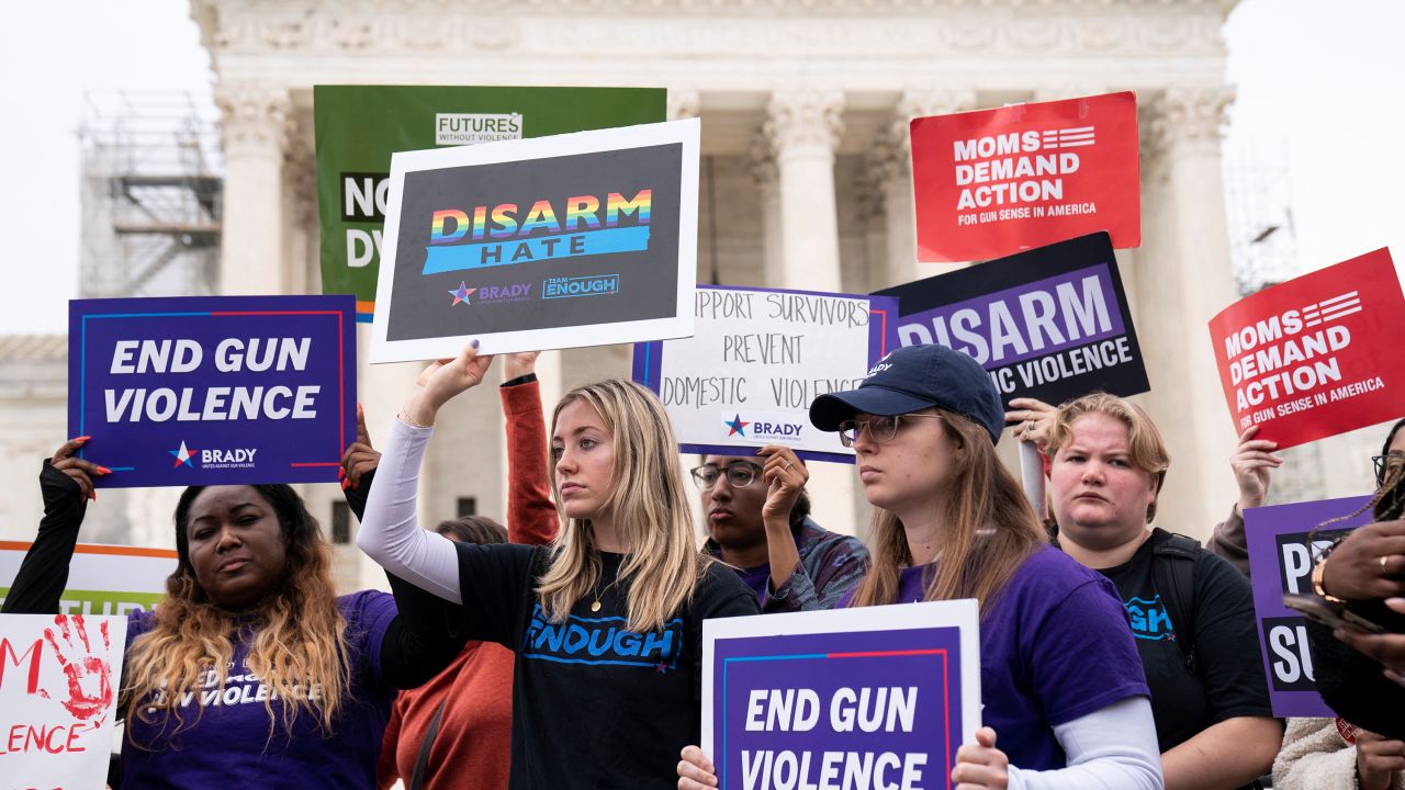 People participate in a demonstration as the US Supreme Court considers legality of domestic-violence gun curbs at the Supreme Court in Washington, D.C., U.S., November 7, 2023. REUTERS/Sarah Silbiger