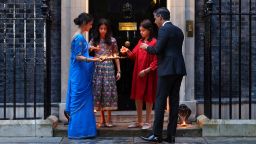 Then-Prime Minister Rishi Sunak, together with his wife Akshata Murty and their children Anoushka and Krishna, light candles outside of 10 Downing Street, during the Hindu festival of Diwali, in November last year.