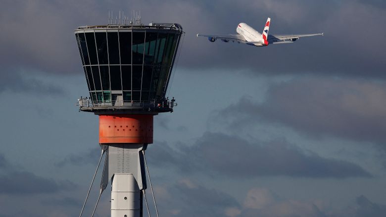 A British Airways Airbus A380 takes off in view of the control tower at Heathrow Airport, in London, Britain, November 28, 2023. 